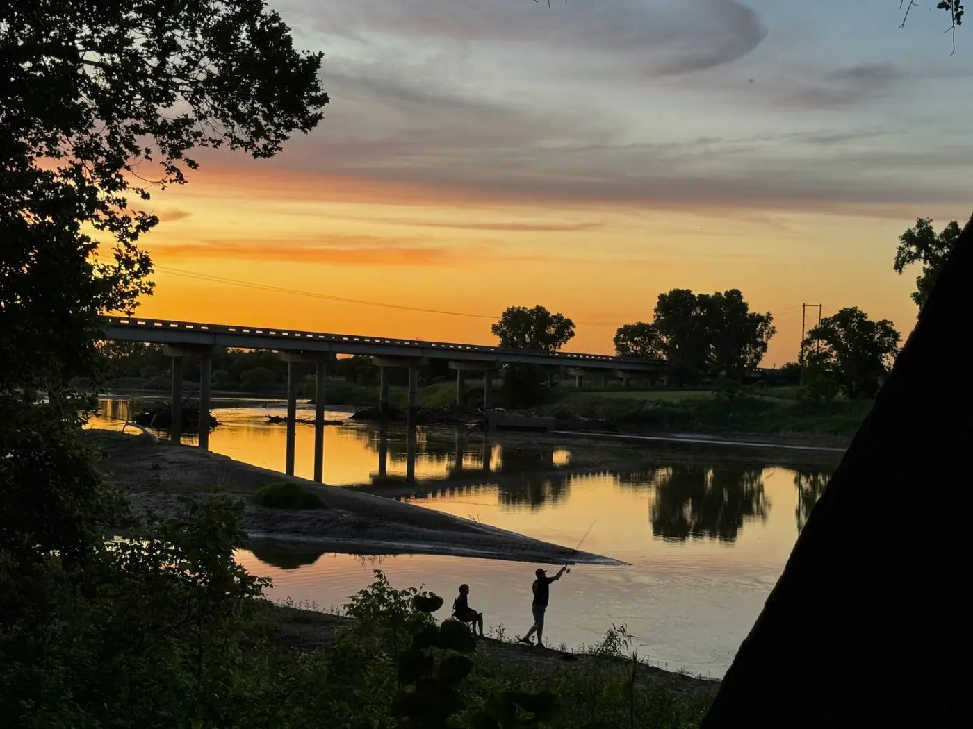 Golden sunset over the Salt Fork River at Rivershire